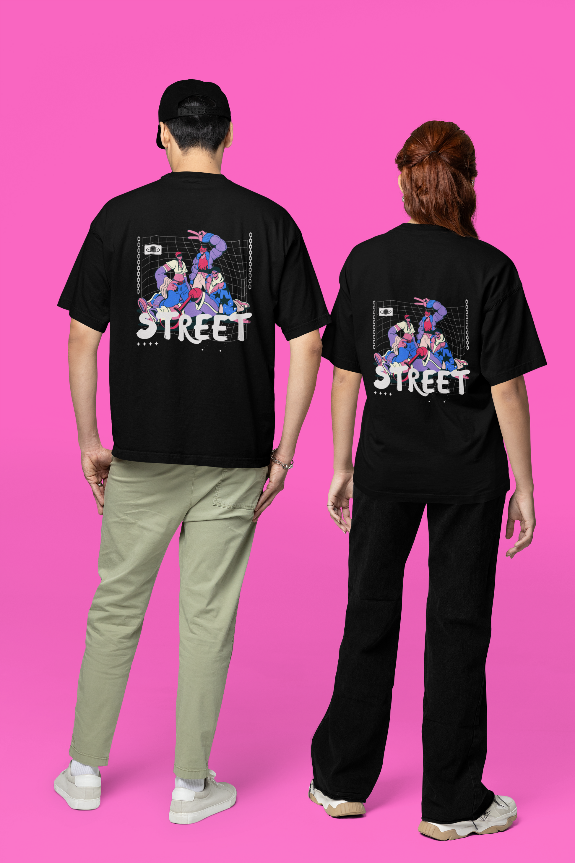 A couple wearing matching black oversized T-shirts with bold Chinese typography and captivating back graphics, exuding trendy streetwear vibes on an urban street