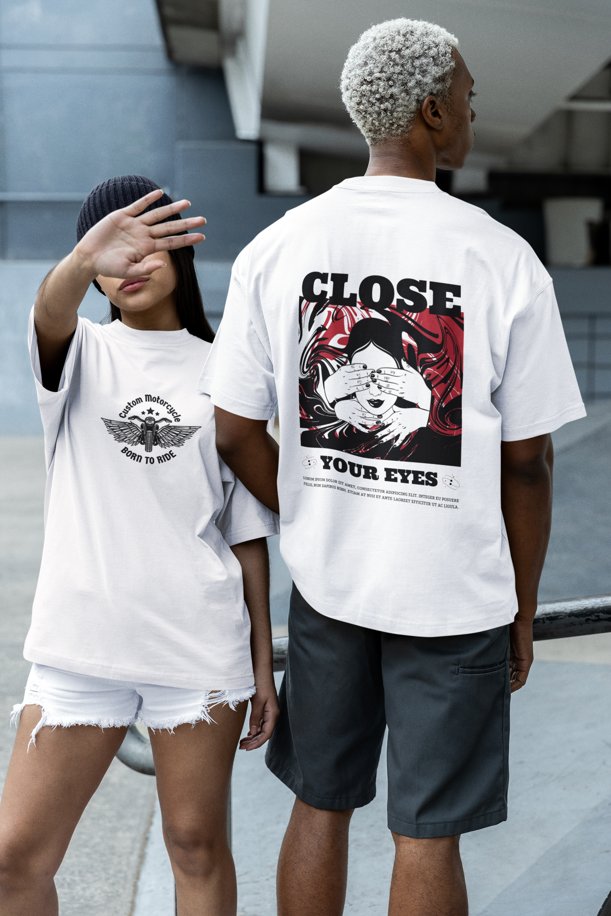 A man and woman in matching white oversized T-shirts displaying the 'Close Your Eyes' painting design on the back, perfect for modern and minimalist streetwear enthusiasts.