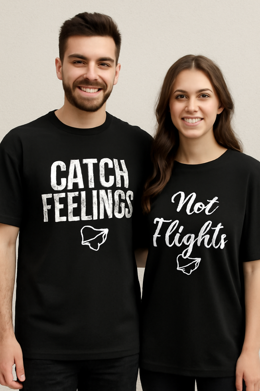 Black unisex oversized couple T-shirt combo mockup featuring the quote 'Caught Feelings, Not Flights,' perfect for Gen Z couples.